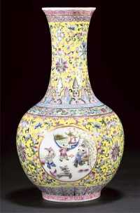 early 20th century A famille rose yellow ground vase